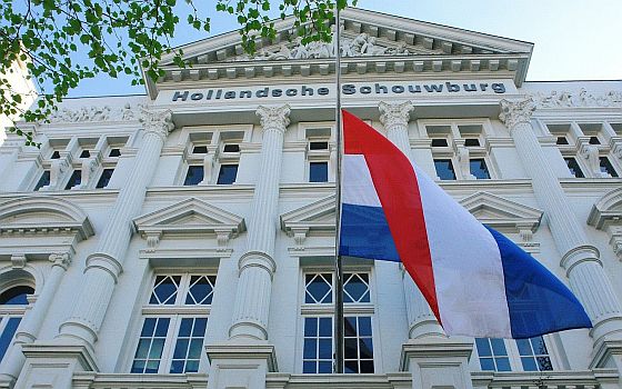 35681_fullimage_jewish quarter holland schouwburg building with dutch flag